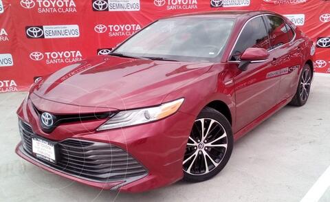 Toyota Camry XLE Hibrido usado (2019) color Rojo financiado en mensualidades(enganche $51,500)