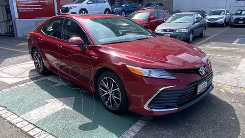 Toyota Camry XLE usado (2021) color Rojo financiado en mensualidades(enganche $191,862 mensualidades desde $8,073)