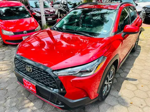 Toyota Corolla Cross HEV LE usado (2024) color Rojo financiado en mensualidades(enganche $144,319 mensualidades desde $12,819)
