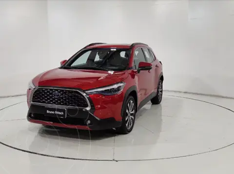 Toyota Corolla Cross Hibrido 1.8L SEG usado (2023) color Rojo financiado en cuotas(pie $3.500.000)