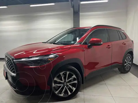 Toyota Corolla Cross XLE usado (2024) color Rojo financiado en mensualidades(enganche $108,900 mensualidades desde $10,743)