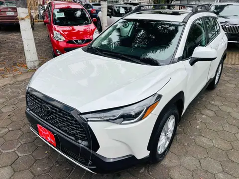Toyota Corolla Cross LE usado (2023) color Blanco financiado en mensualidades(enganche $112,606 mensualidades desde $10,002)