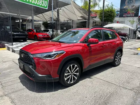 Toyota Corolla Cross LE usado (2024) color Rojo financiado en mensualidades(enganche $164,750 mensualidades desde $13,936)