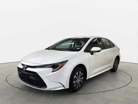 Toyota Corolla HEV LE usado (2026) color Blanco financiado en mensualidades(enganche $109,560 mensualidades desde $10,808)