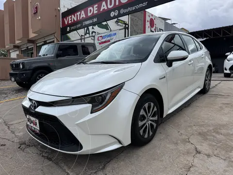 Toyota Corolla HEV Hybrid Aut usado (2021) color Blanco Perla financiado en mensualidades(enganche $100,000 mensualidades desde $10,000)