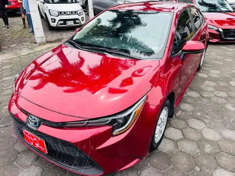 Toyota Corolla HEV Hybrid usado (2022) color Rojo financiado en mensualidades(enganche $95,944 mensualidades desde $8,522)