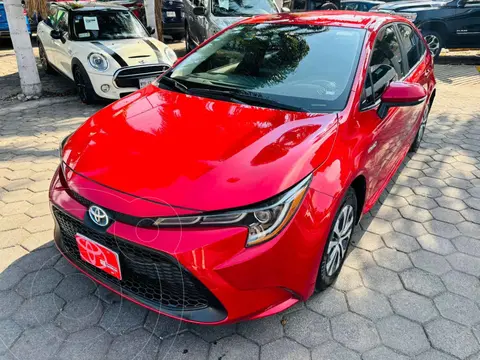 Toyota Corolla HEV Hybrid usado (2021) color Rojo financiado en mensualidades(enganche $104,006 mensualidades desde $9,238)