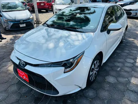 Toyota Corolla HEV Hybrid usado (2022) color Blanco financiado en mensualidades(enganche $104,006 mensualidades desde $9,238)