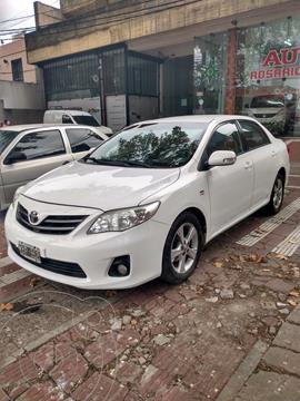 Toyota Corolla 1.8 XEi usado (2013) color Blanco financiado en cuotas(anticipo $840.000)