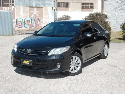 Toyota Corolla 1.8 SE-G usado (2013) color Negro financiado en cuotas(anticipo $9.500.000)