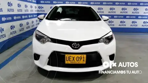 Toyota Corolla 1.8L usado (2015) color Blanco financiado en cuotas(anticipo $7.000.000 cuotas desde $1.650.000)