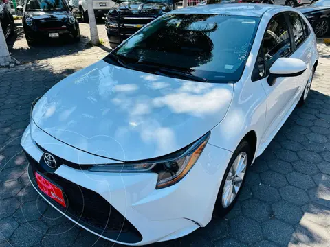 Toyota Corolla LE Aut usado (2022) color Blanco financiado en mensualidades(enganche $98,631 mensualidades desde $8,761)