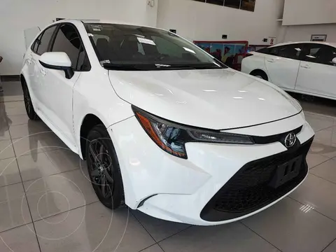 Toyota Corolla Base Aut usado (2022) color Blanco financiado en mensualidades(enganche $95,000 mensualidades desde $7,006)