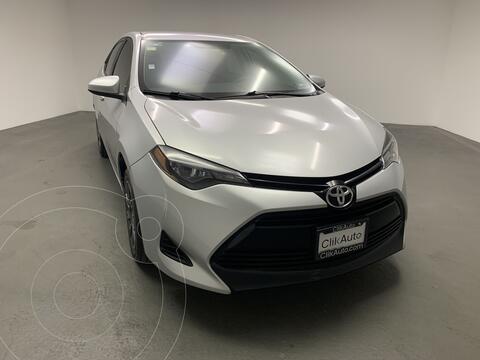 Toyota Corolla Base usado (2018) color Plata financiado en mensualidades(enganche $54,000 mensualidades desde $7,000)