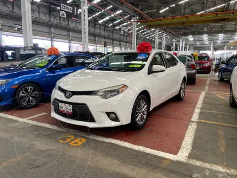 Toyota Corolla LE Aut usado (2015) color Blanco financiado en mensualidades(enganche $60,000 mensualidades desde $7,000)