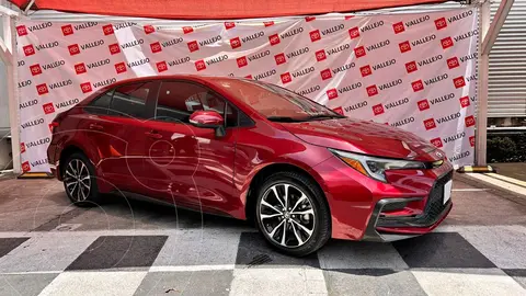Toyota Corolla SE Aut usado (2024) color Rojo financiado en mensualidades(enganche $200,640 mensualidades desde $8,620)