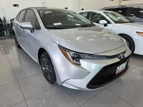 Toyota Corolla Base Aut usado (2024) color Plata financiado en mensualidades(enganche $99,438 mensualidades desde $8,396)