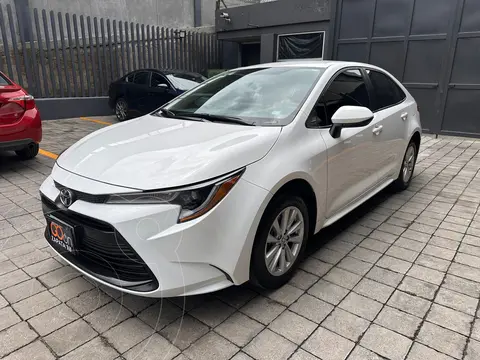 Toyota Corolla Base Aut usado (2024) color Blanco financiado en mensualidades(enganche $117,175 mensualidades desde $8,960)