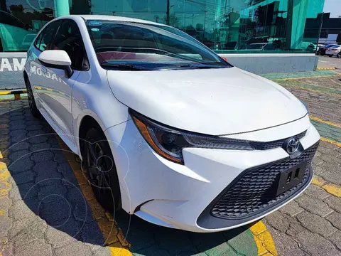 Toyota Corolla Base Aut usado (2020) color Blanco financiado en mensualidades(enganche $85,000 mensualidades desde $6,269)
