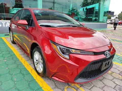 Toyota Corolla LE Aut usado (2022) color Rojo financiado en mensualidades(enganche $105,000 mensualidades desde $7,744)