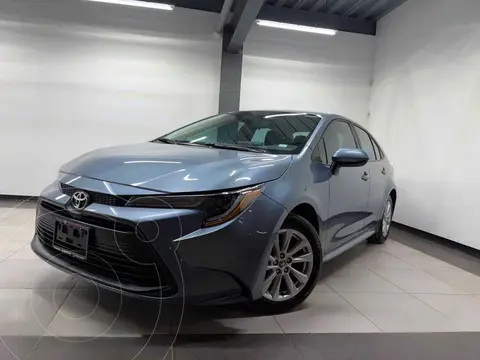 Toyota Corolla LE Aut usado (2024) color Azul financiado en mensualidades(enganche $91,300 mensualidades desde $9,007)
