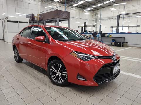 Toyota Corolla LE 1.8L usado (2017) color Rojo precio $280,000