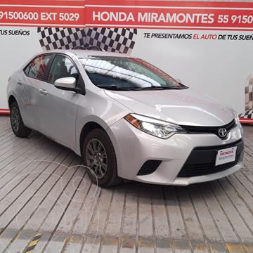 Toyota Corolla Base usado (2014) color Plata Metalico financiado en mensualidades(enganche $70,000 mensualidades desde $5,380)