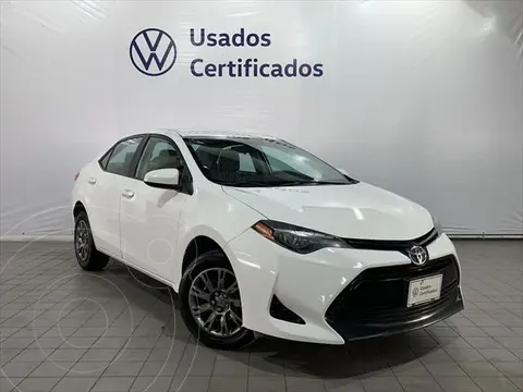 Toyota Corolla Base usado (2019) color Blanco financiado en mensualidades(enganche $69,750 mensualidades desde $5,231)