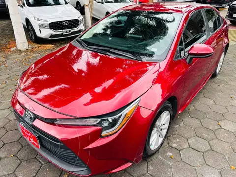 Toyota Corolla LE Aut usado (2023) color Rojo financiado en mensualidades(enganche $98,631 mensualidades desde $8,761)