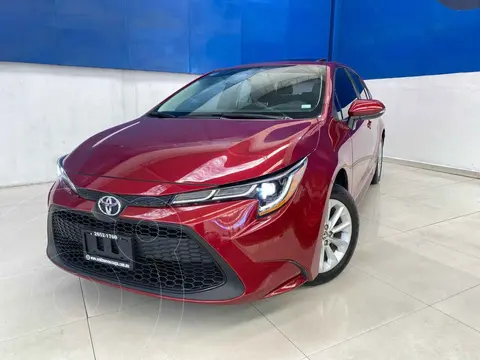 Toyota Corolla XLE Aut usado (2022) color Rojo financiado en mensualidades(enganche $99,500 mensualidades desde $7,152)