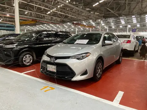 Toyota Corolla Base Aut usado (2017) color Gris Metalico financiado en mensualidades(enganche $55,000 mensualidades desde $5,600)