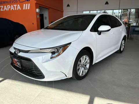 Toyota Corolla LE Aut usado (2024) color Blanco financiado en mensualidades(enganche $106,002 mensualidades desde $8,106)