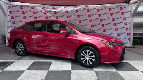 Toyota Corolla LE Aut usado (2020) color Rojo financiado en mensualidades(enganche $131,670 mensualidades desde $5,657)