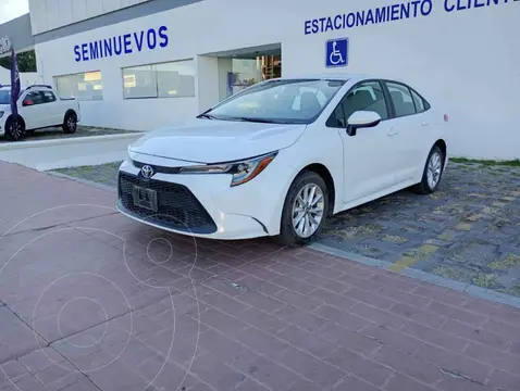 Toyota Corolla LE 1.8L Aut usado (2020) color Blanco financiado en mensualidades(enganche $70,180 mensualidades desde $6,920)