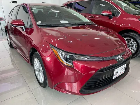 Toyota Corolla LE Aut usado (2024) color Rojo financiado en mensualidades(enganche $107,500 mensualidades desde $9,077)