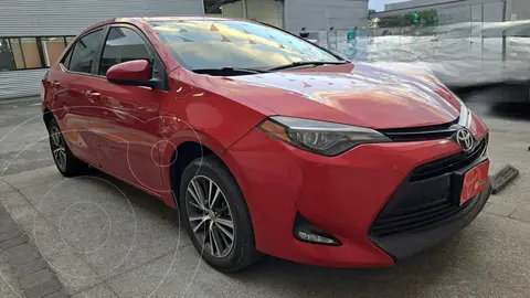 Toyota Corolla LE Aut usado (2019) color Rojo precio $320,000