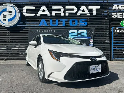 Toyota Corolla LE Aut usado (2021) color Blanco financiado en mensualidades(enganche $67,980 mensualidades desde $7,085)