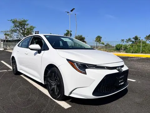 Toyota Corolla Base Aut usado (2022) color Blanco financiado en mensualidades(enganche $68,200 mensualidades desde $8,295)