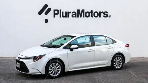 Toyota Corolla LE Aut usado (2021) color Blanco financiado en mensualidades(enganche $73,480 mensualidades desde $6,261)