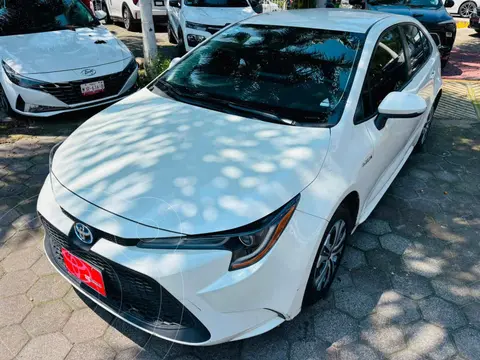 Toyota Corolla LE Aut usado (2021) color Blanco financiado en mensualidades(enganche $90,569 mensualidades desde $8,045)