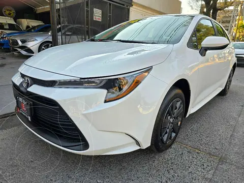 Toyota Corolla Base Aut usado (2024) color Blanco financiado en mensualidades(enganche $117,443 mensualidades desde $7,301)