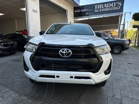 Toyota Hilux Cabina Doble SR usado (2021) color Blanco financiado en mensualidades(enganche $90,000 mensualidades desde $14,131)