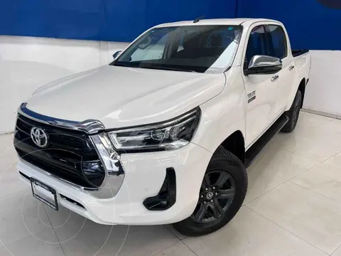 Toyota Hilux Cabina Doble Diesel Aut usado (2021) color Blanco financiado en mensualidades(enganche $155,052 mensualidades desde $12,770)