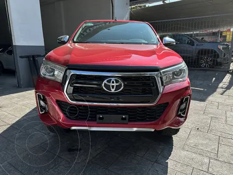 Toyota Hilux Cabina Doble Diesel Aut usado (2020) color Rojo financiado en mensualidades(enganche $124,000 mensualidades desde $19,144)