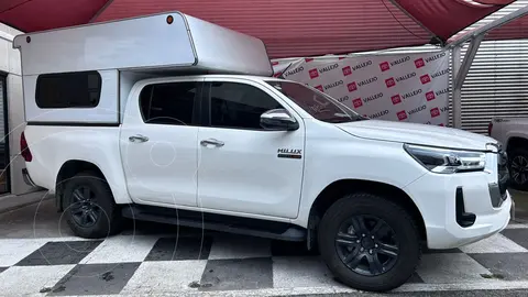 Toyota Hilux Cabina Doble Diesel usado (2024) color Blanco financiado en mensualidades(enganche $284,240 mensualidades desde $12,211)