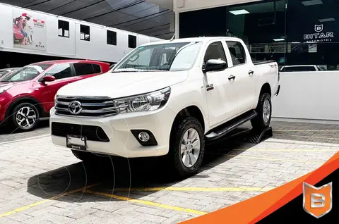 Toyota Hilux Cabina Doble Diesel usado (2022) color Blanco financiado en mensualidades(enganche $130,800 mensualidades desde $12,191)