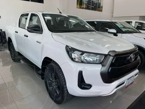 Toyota Hilux Cabina Doble SR usado (2021) color Blanco financiado en mensualidades(enganche $120,938 mensualidades desde $10,211)