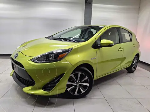 Toyota Prius C 1.5L usado (2018) color Amarillo financiado en mensualidades(enganche $51,700 mensualidades desde $5,100)