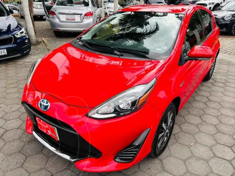 Toyota Prius C 1.5L usado (2020) color Rojo financiado en mensualidades(enganche $64,231 mensualidades desde $5,705)