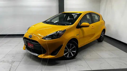 Toyota Prius C 1.5L usado (2021) color Amarillo financiado en mensualidades(enganche $72,600 mensualidades desde $7,162)